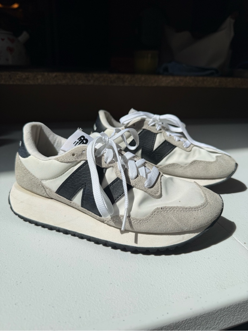 New Balance Cream White and Black Retro Sneakers
